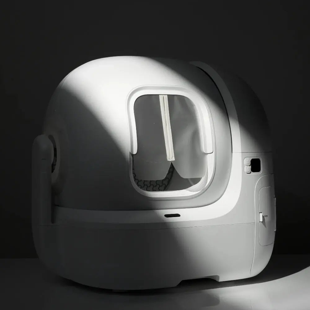 gordijn in kattenbak in grijs en wit kleuren