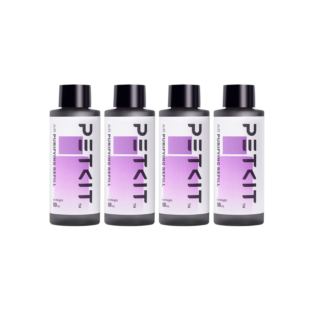 Vier PETKIT Air Purifying Refill flessen in zwart met paars etiket.